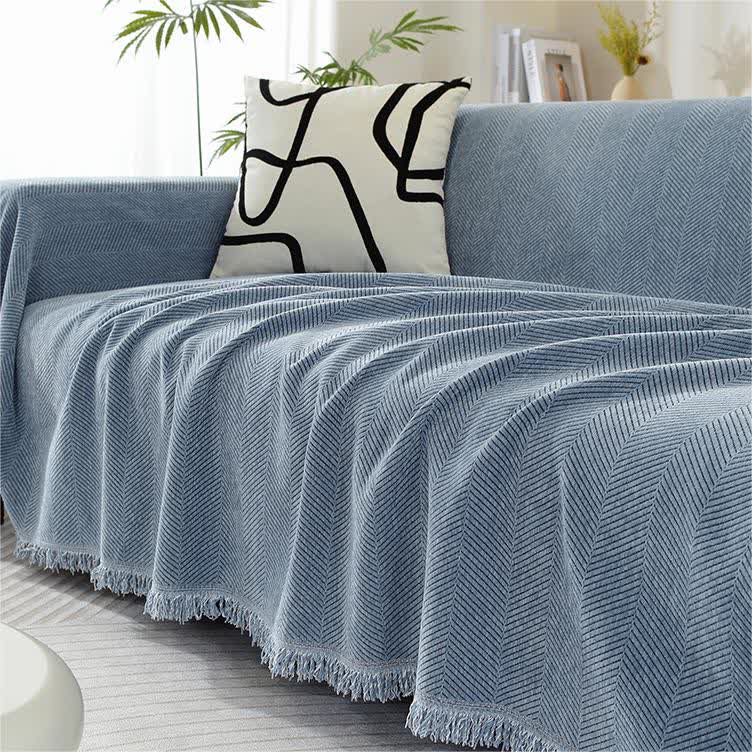 Housse de canapé en chenille avec motif à chevrons et pompons