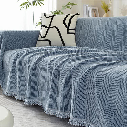 Housse de canapé en chenille avec motif à chevrons et pompons