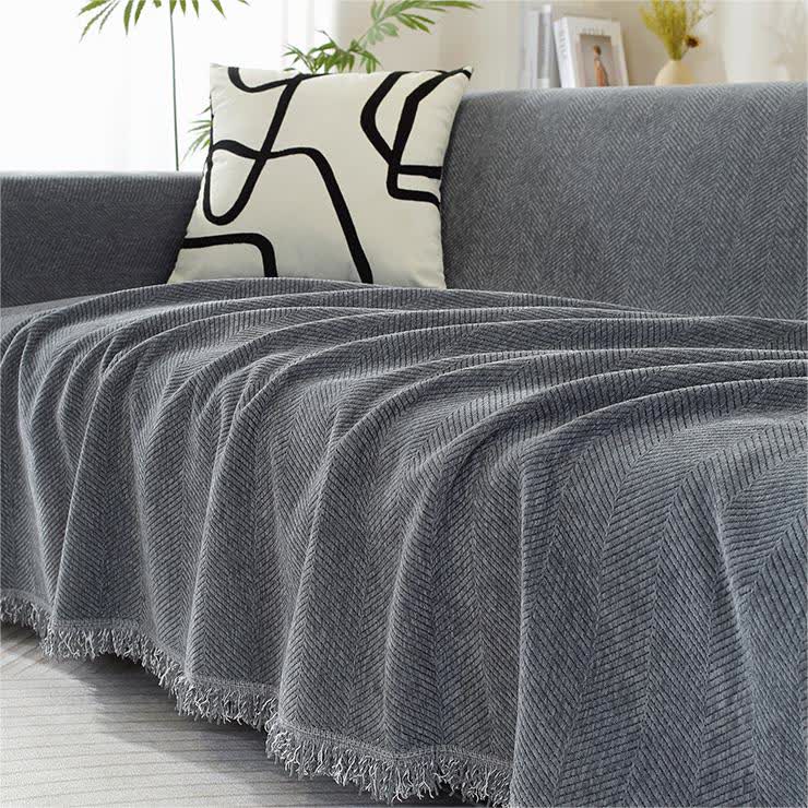 Housse de canapé en chenille avec motif à chevrons et pompons