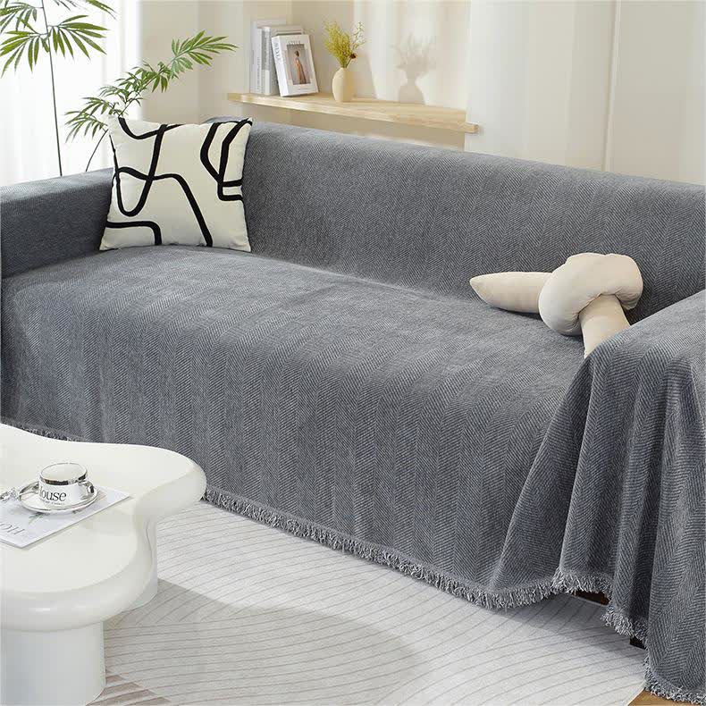 Housse de canapé en chenille avec motif à chevrons et pompons