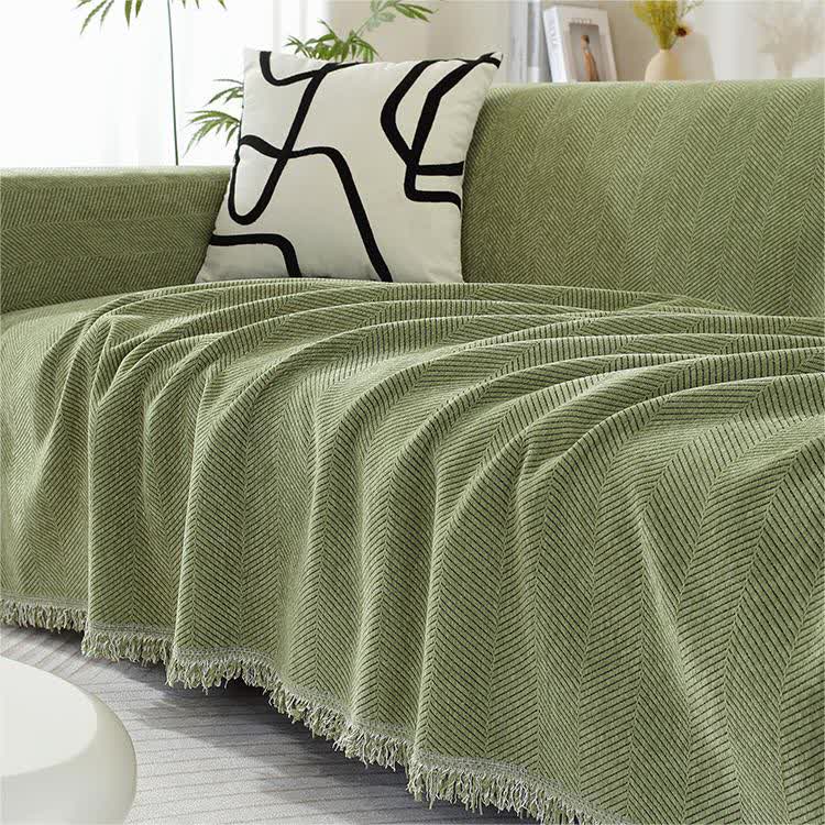 Housse de canapé en chenille avec motif à chevrons et pompons