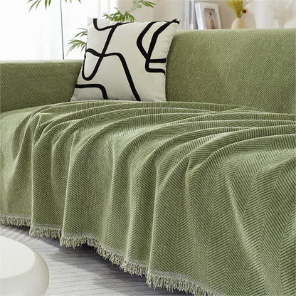Housse de canapé en chenille avec motif à chevrons et pompons