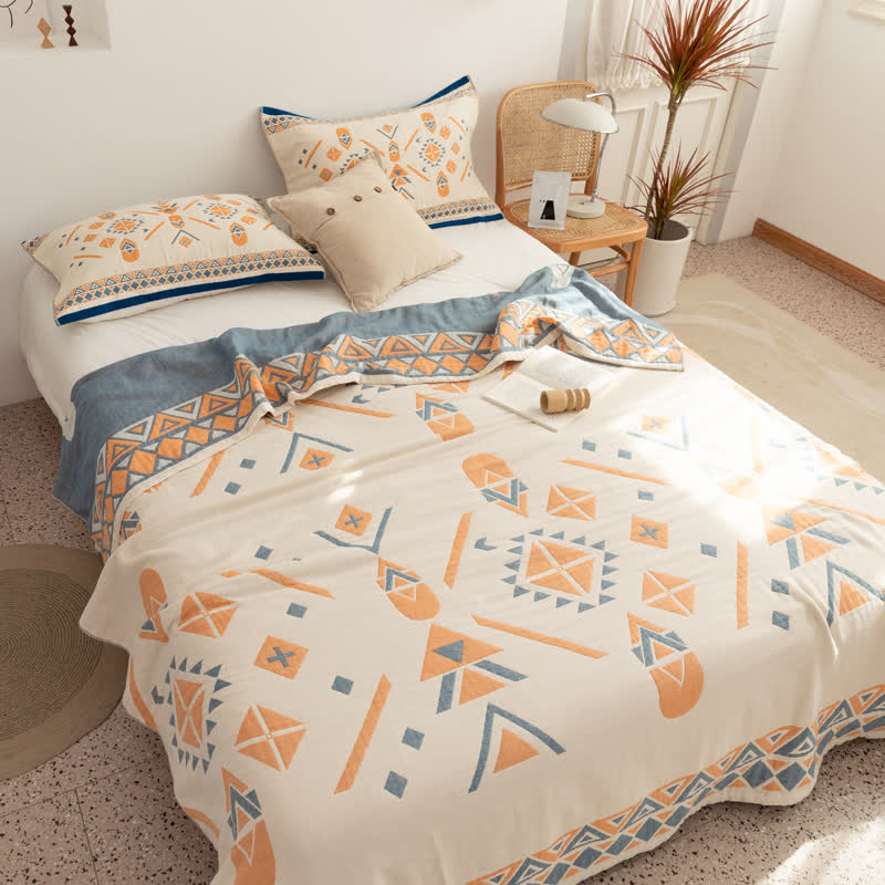 Couette réversible en gaze de coton de style bohème à motif géométrique