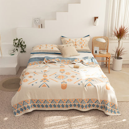 Couette réversible en gaze de coton de style bohème à motif géométrique