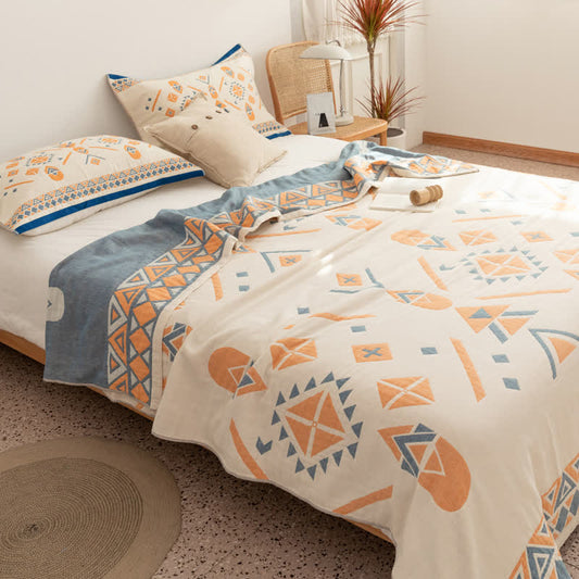 Couette réversible en gaze de coton de style bohème à motif géométrique