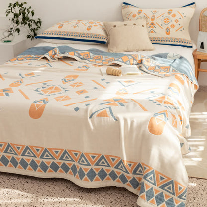 Couette réversible en gaze de coton de style bohème à motif géométrique