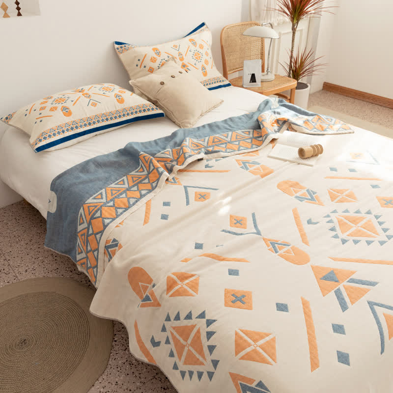 Couette réversible en gaze de coton de style bohème à motif géométrique