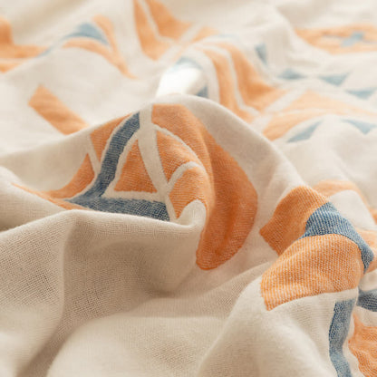 Couette réversible en gaze de coton de style bohème à motif géométrique