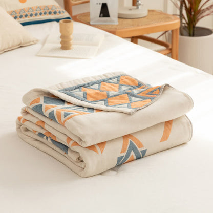 Couette réversible en gaze de coton de style bohème à motif géométrique