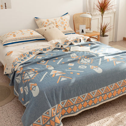Couette réversible en gaze de coton de style bohème à motif géométrique