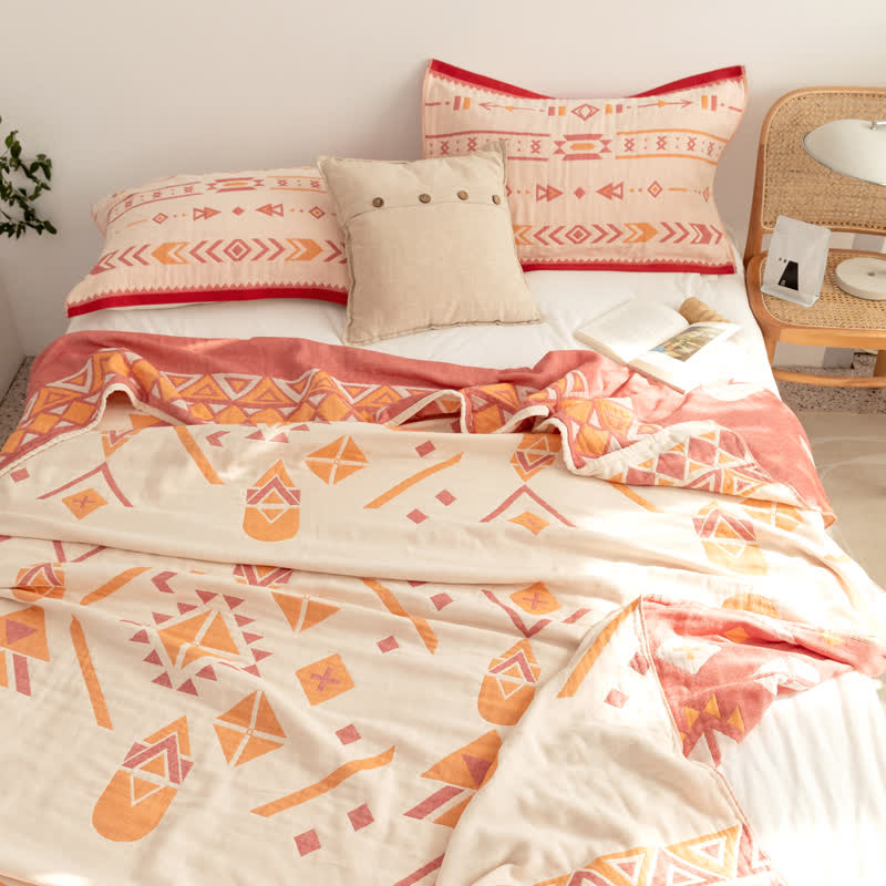 Couette réversible en gaze de coton de style bohème à motif géométrique