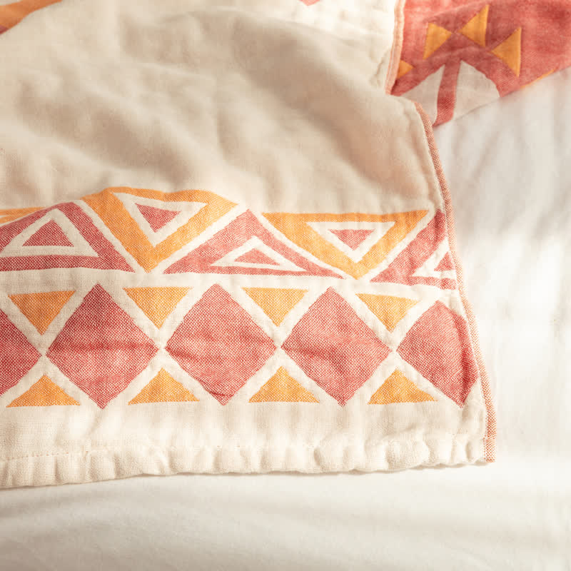 Couette réversible en gaze de coton de style bohème à motif géométrique