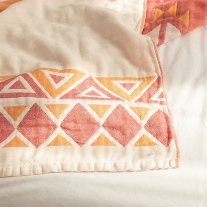 Couette réversible en gaze de coton de style bohème à motif géométrique