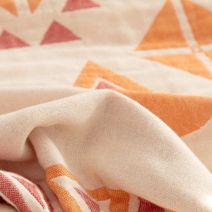 Couette réversible en gaze de coton de style bohème à motif géométrique