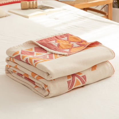Couette réversible en gaze de coton de style bohème à motif géométrique