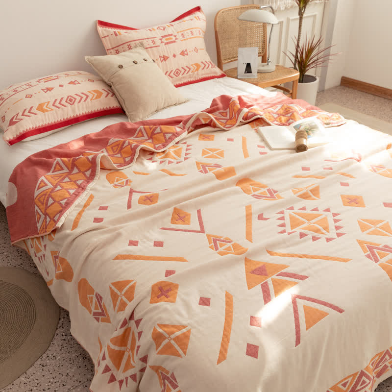 Couette réversible en gaze de coton de style bohème à motif géométrique