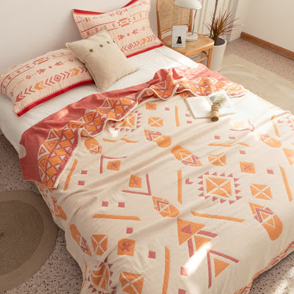 Couette réversible en gaze de coton de style bohème à motif géométrique