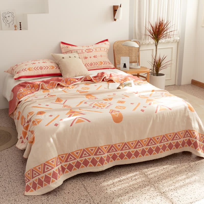 Couette réversible en gaze de coton de style bohème à motif géométrique