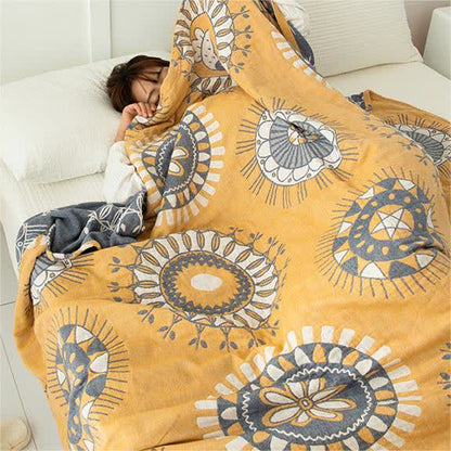 Couverture en gaze de coton à quatre couches avec motif floral