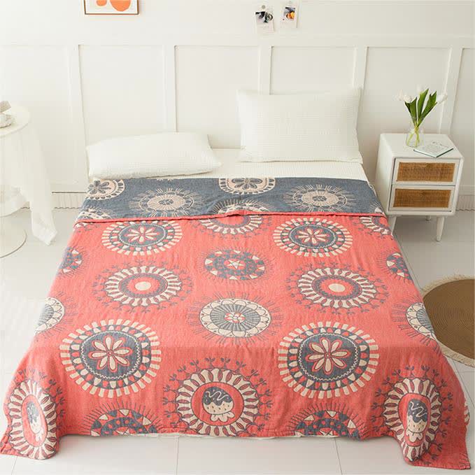 Couverture en gaze de coton à quatre couches avec motif floral