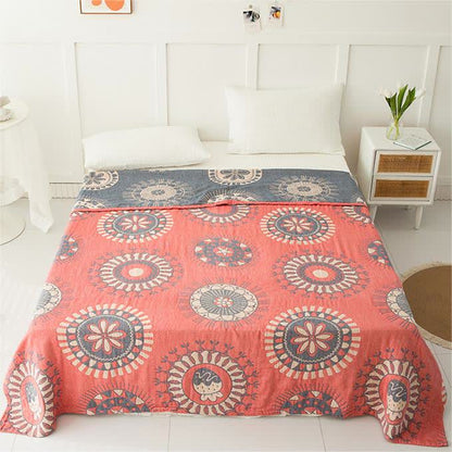 Couverture en gaze de coton à quatre couches avec motif floral