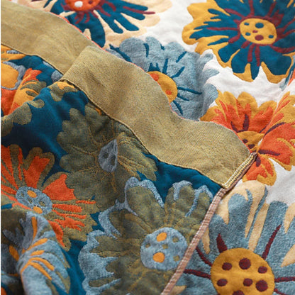 Couette réversible en coton avec des fleurs aux couleurs vives