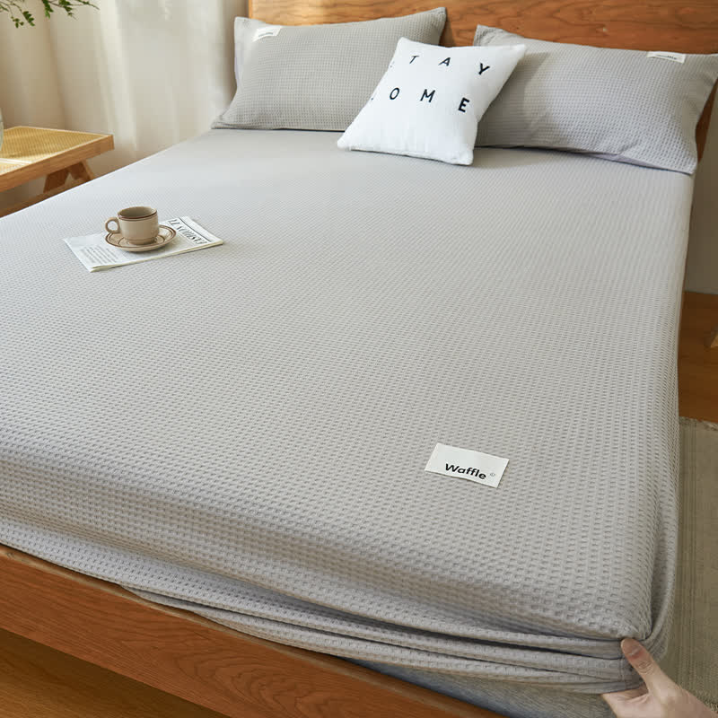 Drap-housse en pur coton avec structure gaufrée