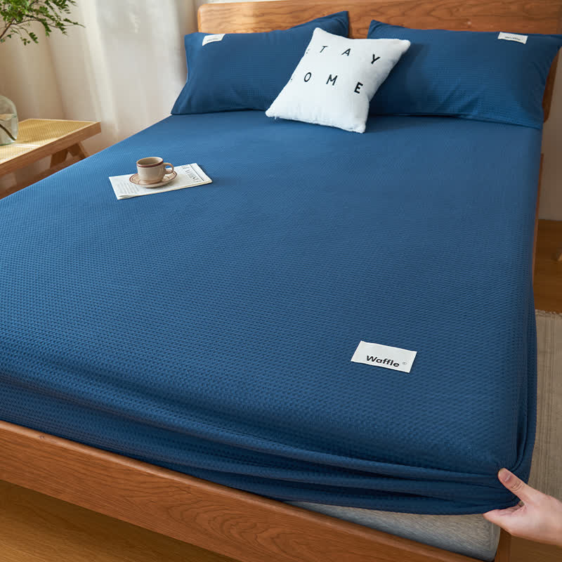 Drap-housse en pur coton avec structure gaufrée