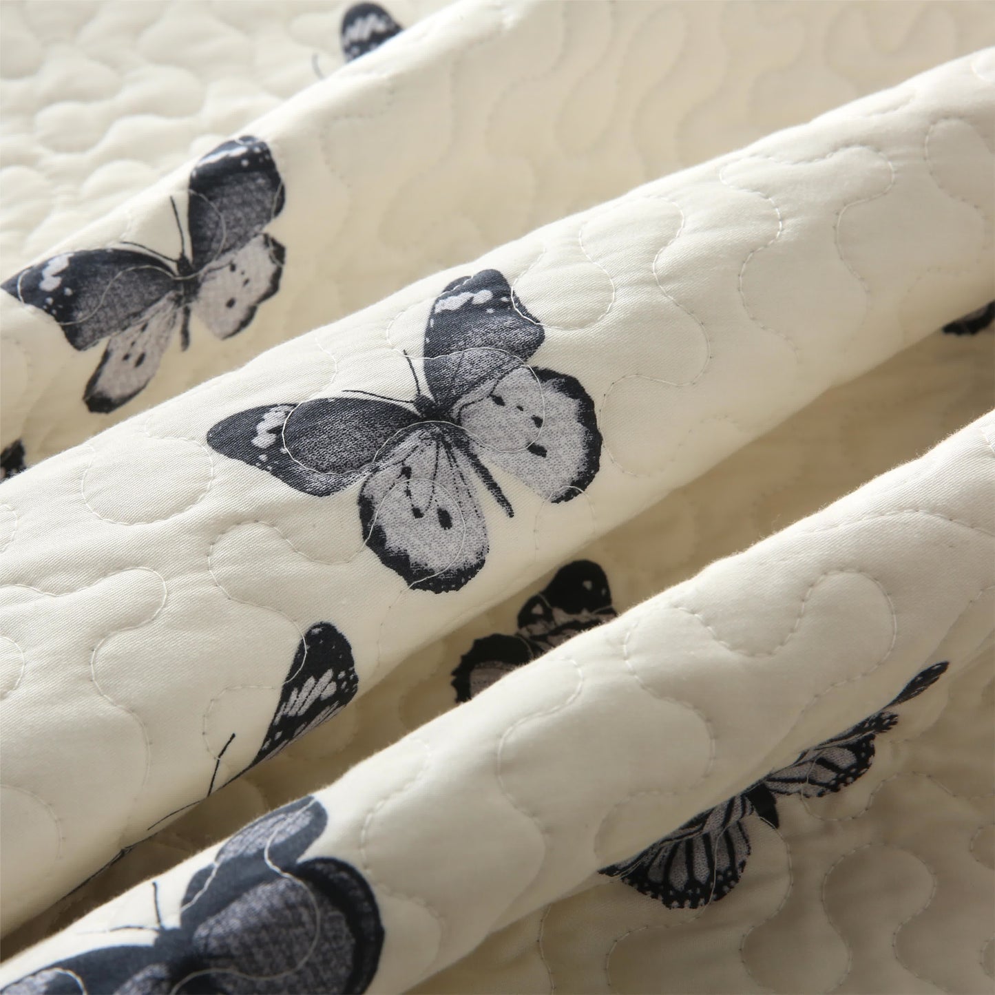 Linge de lit matelassé élégant en pur coton avec motif papillon