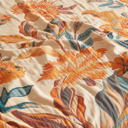 Couette en pur coton avec motif floral et pompons
