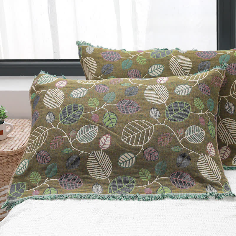 Serviette oreiller en gaze de coton avec pompons et feuilles (2 pièces)
