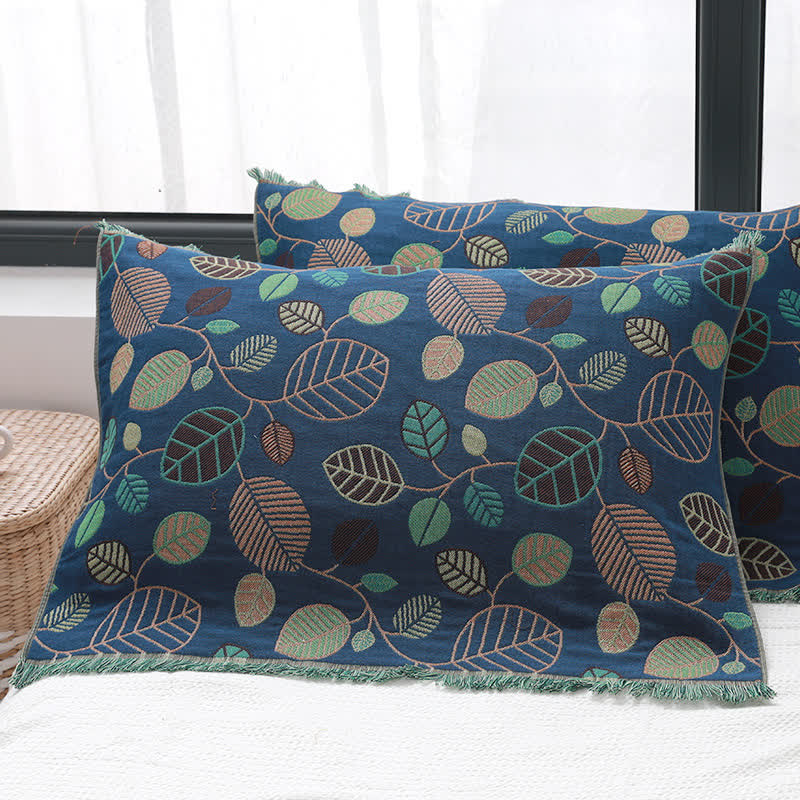 Serviette oreiller en gaze de coton avec pompons et feuilles (2 pièces)