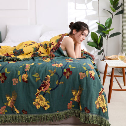 Couette réversible en coton à motif floral et pompons « Pie »