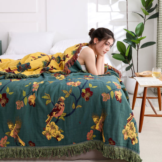 Couette réversible en coton à motif floral et pompons « Pie »