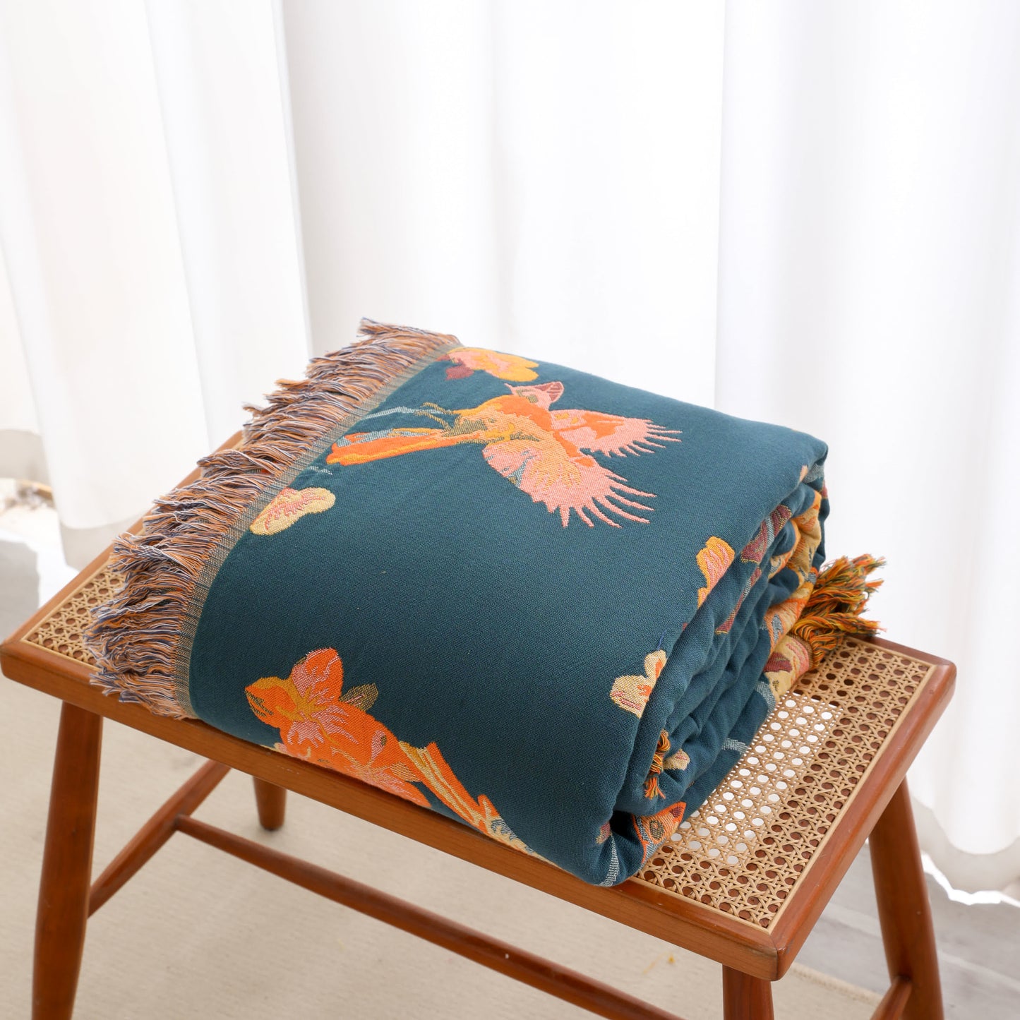 Couette réversible en coton à motif floral et pompons « Pie »