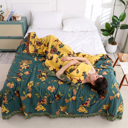 Couette réversible en coton à motif floral et pompons « Pie »