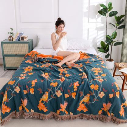 Couette réversible en coton à motif floral et pompons « Pie »
