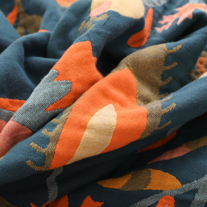 Couette en gaze de coton respirante avec pompons et motif floral