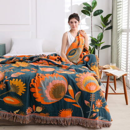 Couette en gaze de coton respirante avec pompons et motif floral