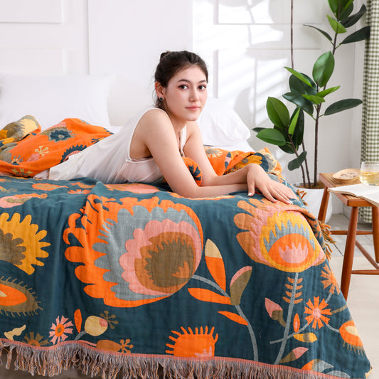 Couette en gaze de coton respirante avec pompons et motif floral