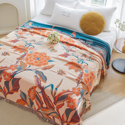 Couette en gaze de coton avec motif floral et feuilles et pompons