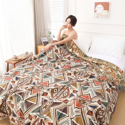 Couette rétro en gaze de coton avec pompons triangulaires
