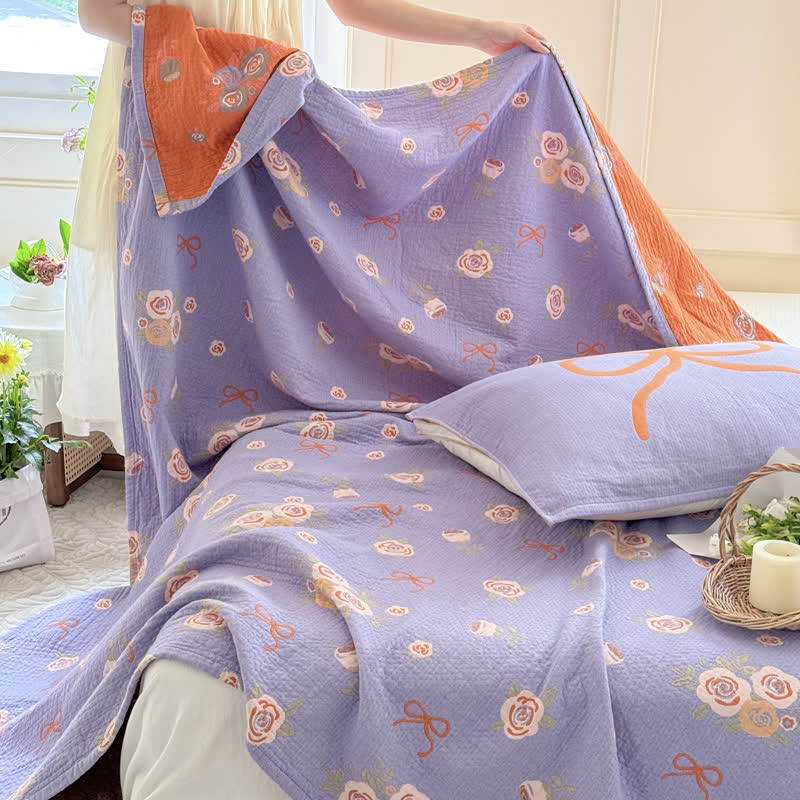 Couette en gaze de coton avec nœud et rose