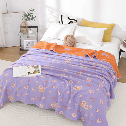 Couette en gaze de coton avec nœud et rose