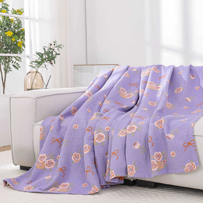 Couette en gaze de coton avec nœud et rose