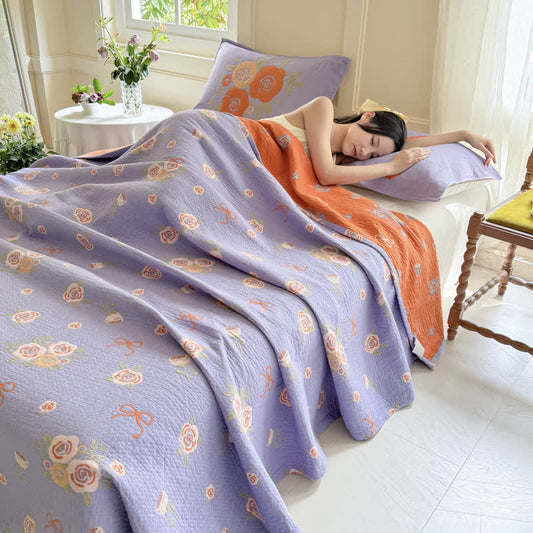 Couette en gaze de coton avec nœud et rose
