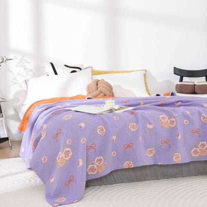 Couette en gaze de coton avec nœud et rose