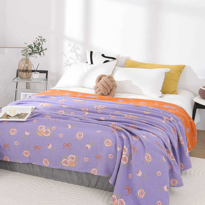 Couette en gaze de coton avec nœud et rose