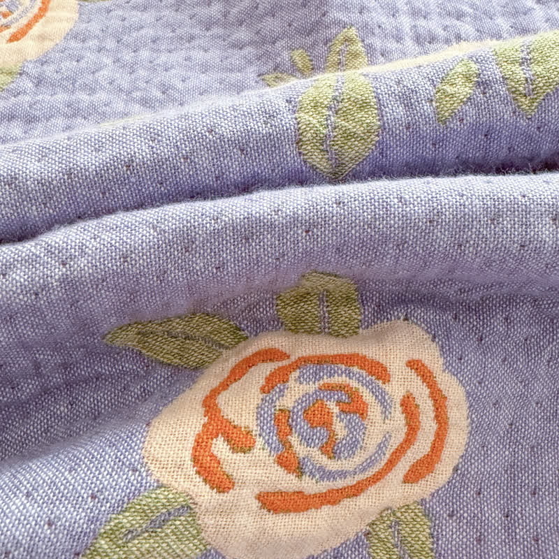 Couette en gaze de coton avec nœud et rose