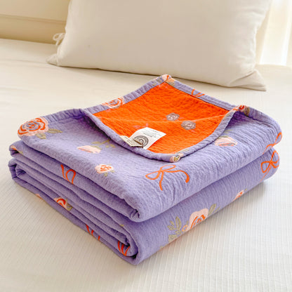 Couette en gaze de coton avec nœud et rose